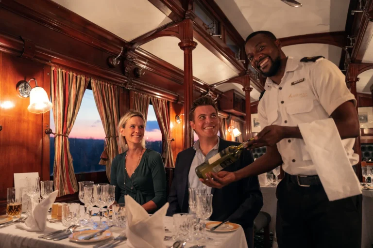 Guests dining aboard the Royal Livingstone Express train